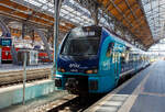 Der zweiteilige erixx Stadler FLIRT� Akku 526 022 / 826 022 (94 80 2526 022-5 D-SRSDE / 94 80 2826 022-2 D-SRSDE) im NAH.SH-Design (Schleswig-Holstein), als RB 84 L�beck Hbf nach Kiel Hbf, am 21 April
