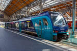 Der zweiteilige erixx Stadler FLIRT� Akku 526 022 / 826 022 (94 80 2526 022-5 D-SRSDE / 94 80 2826 022-2 D-SRSDE) im NAH.SH-Design (Schleswig-Holstein), als RB 84 L�beck Hbf nach Kiel Hbf, am 21 April
